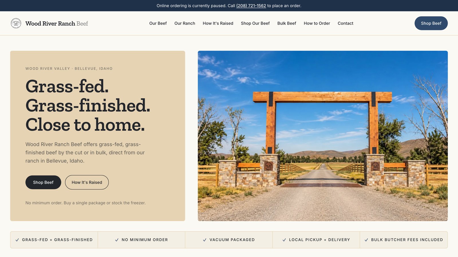The redesigned Wood River Ranch Beef homepage: a cream editorial hero beside a photo of the ranch gate on Highway 75